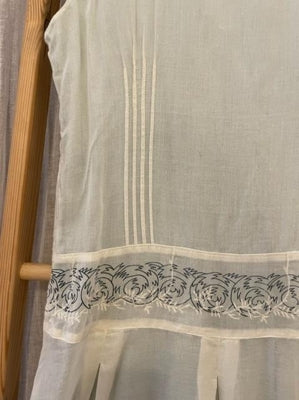 Preloved Pale blue summer dress with patterns and detailing