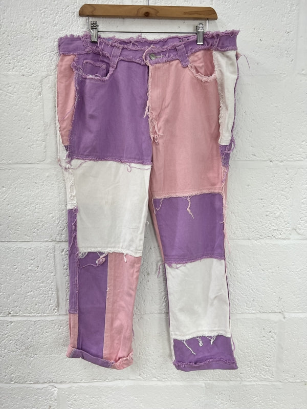 Preloved Boyfriend Fit Patchwork Jeans in size W28